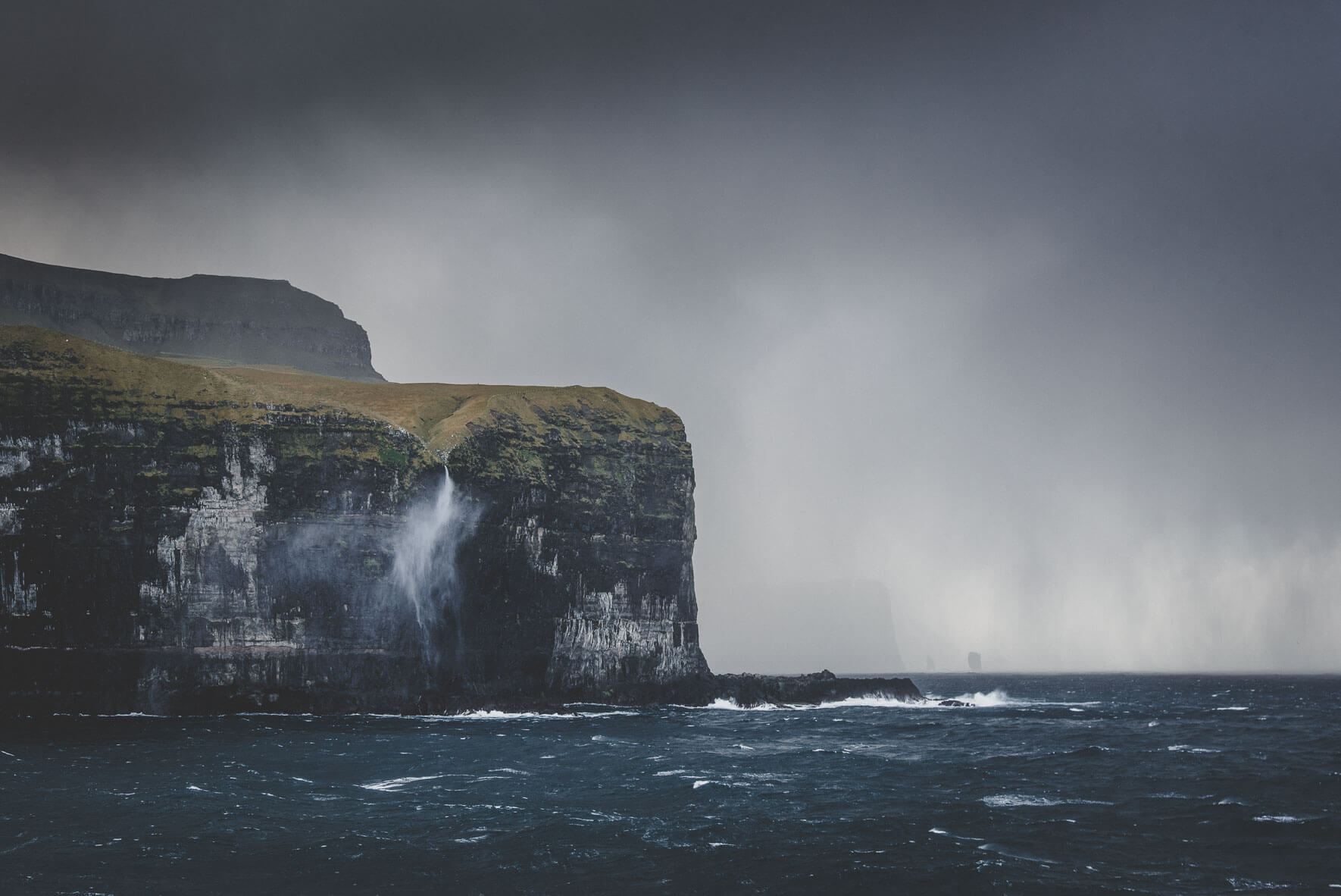 Stormy coastline of the Faroe Islands in Winter