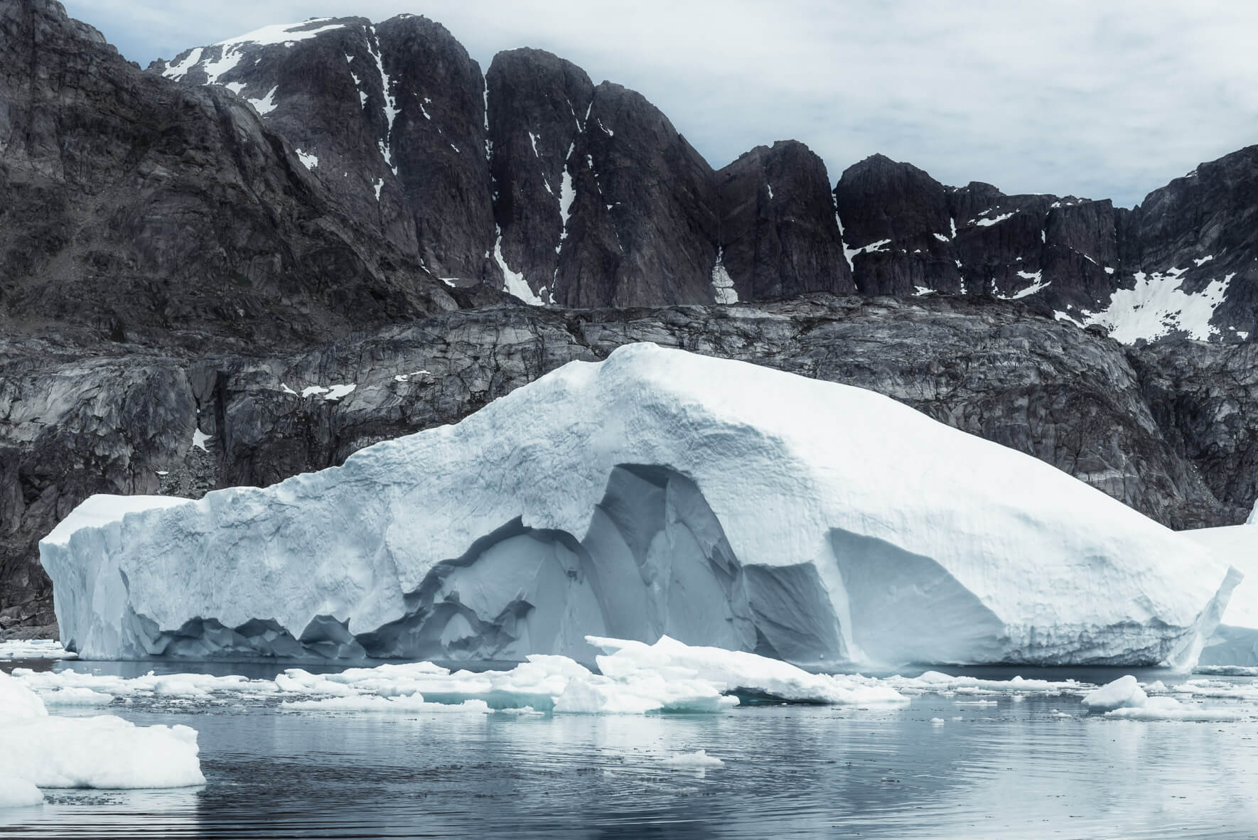 Iceberg floating in Ammassalik Fjord in Greenland