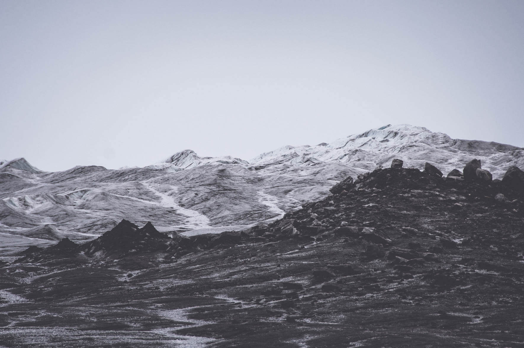 Dark rocks on the inland ice near Kangerlussuaq in Greenland