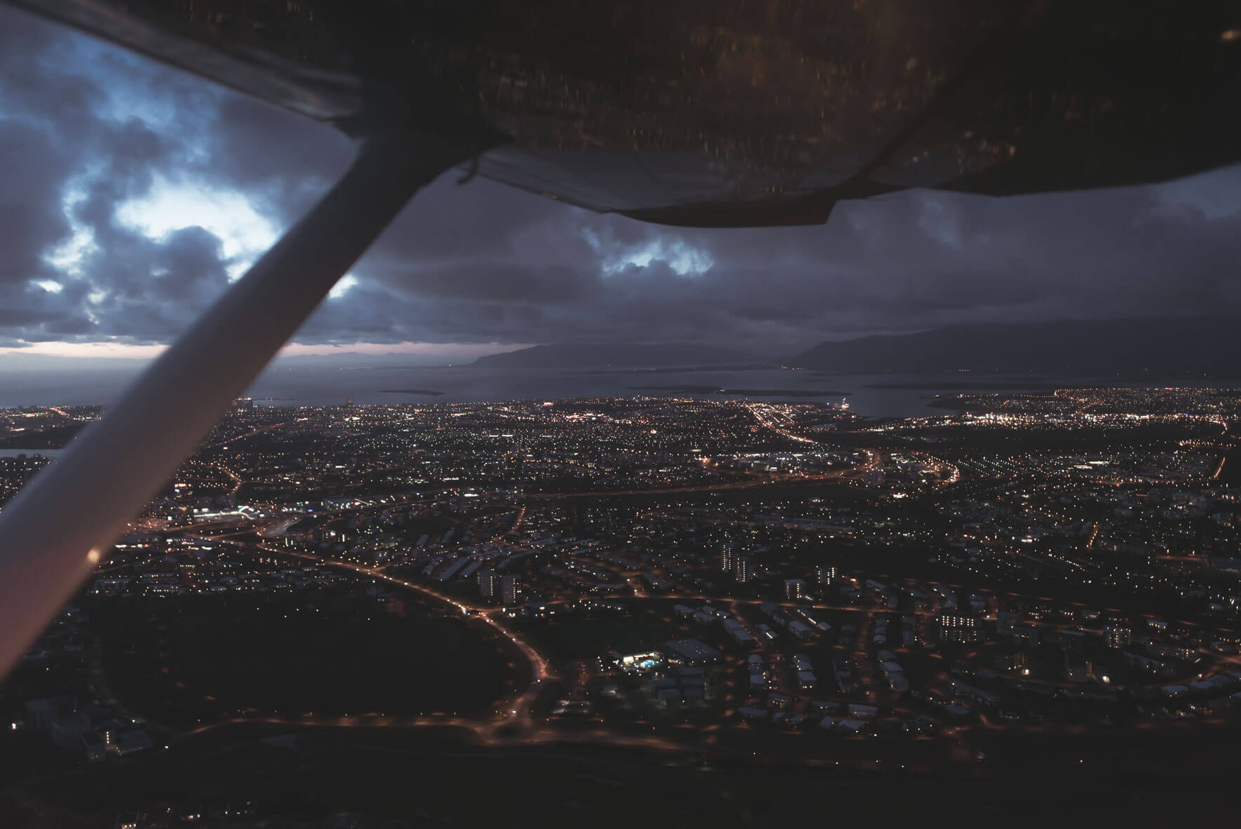 Reykjavik in the evening seen from a Cessna 207 plane