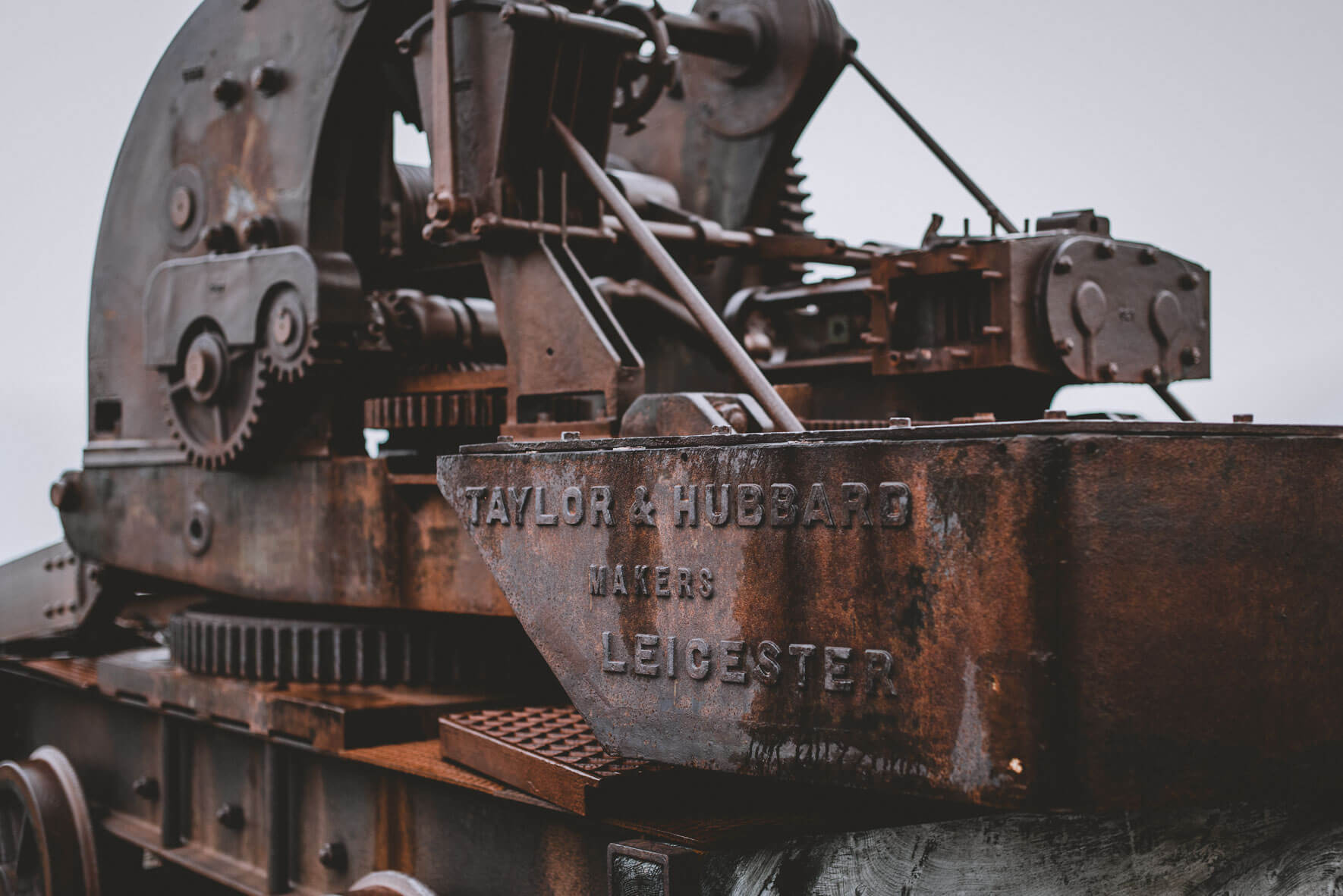 Rusted crane from the old marble mine at Camp Mansfield (New London/Ny-London, Svalbard)