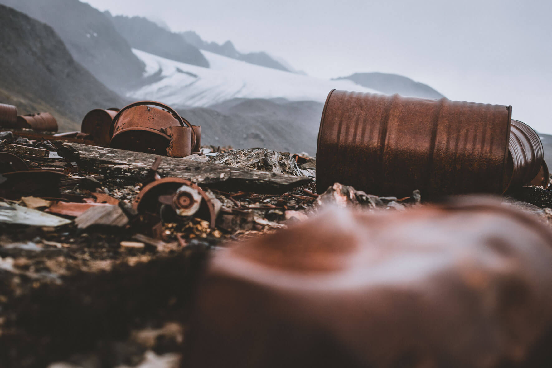 Old oil barrels from a German weather station, destroyed in World War II by Norwegian commandos (Signehamma Bay, Svalbard)