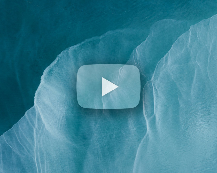 Abstract aerial video series of waves and glacial meltwater